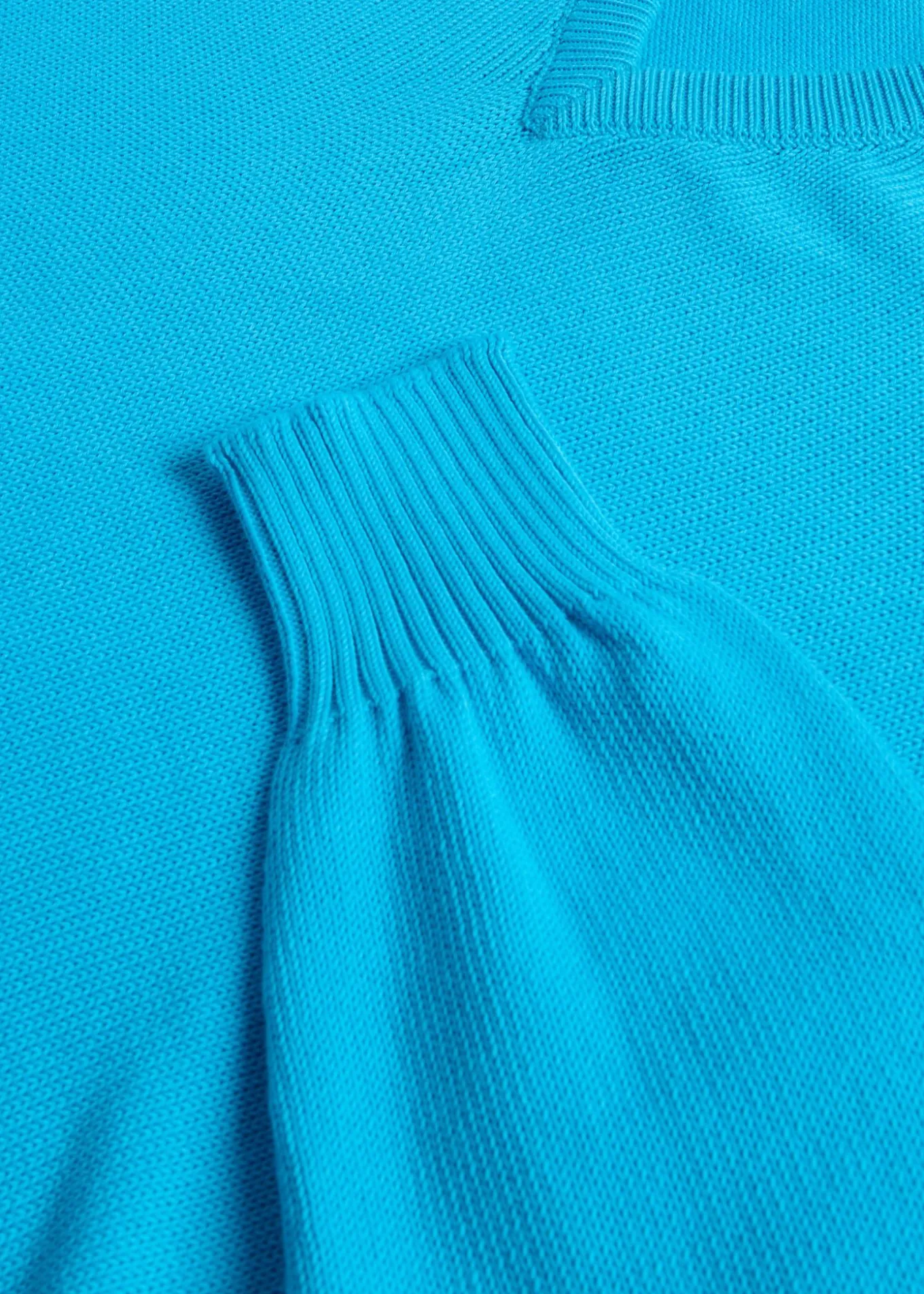 cotton_vneck_sweater_1.webp Cotton V-Neck Sweater